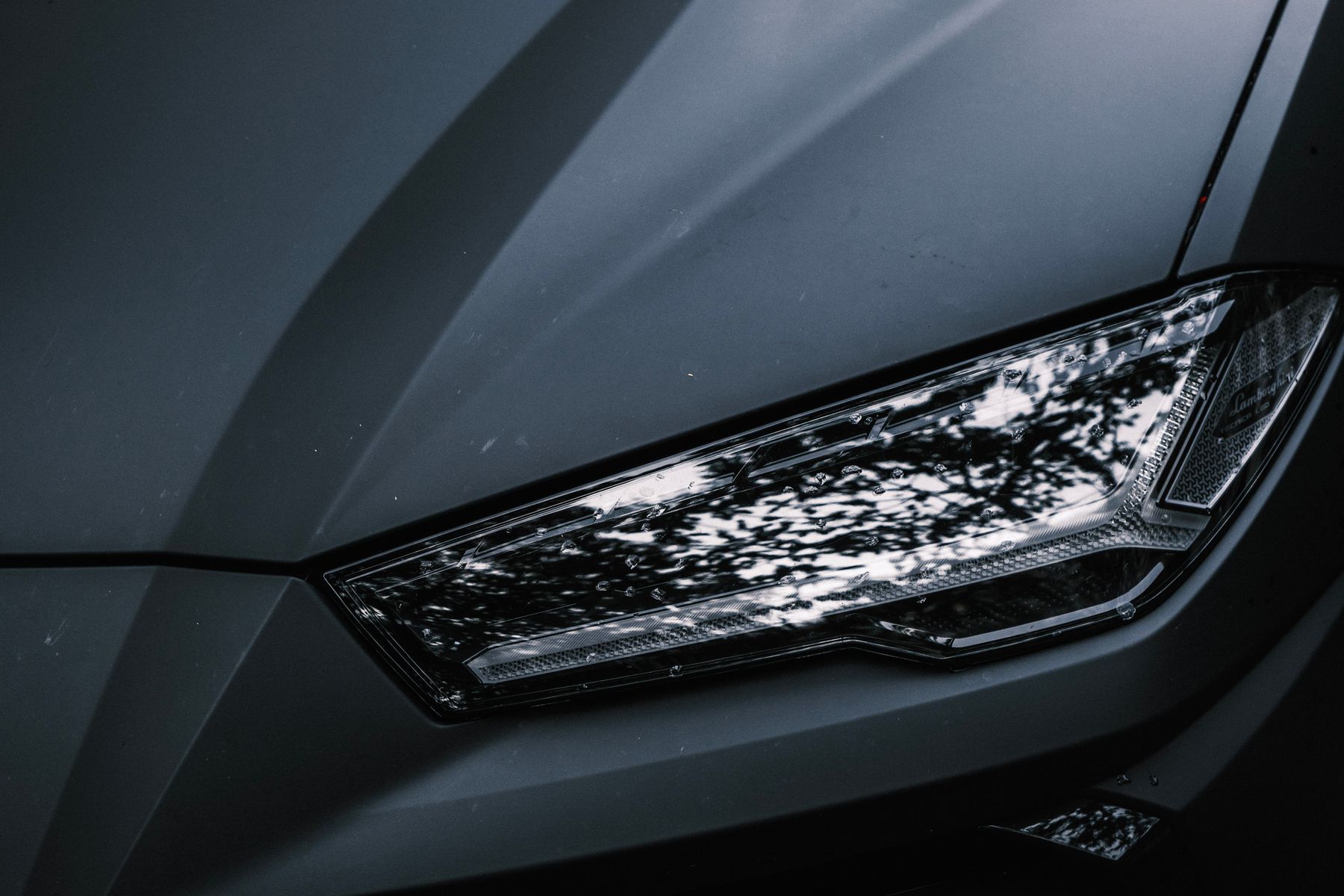 Close-up of an automotive headlamp, shown as an application illustration
